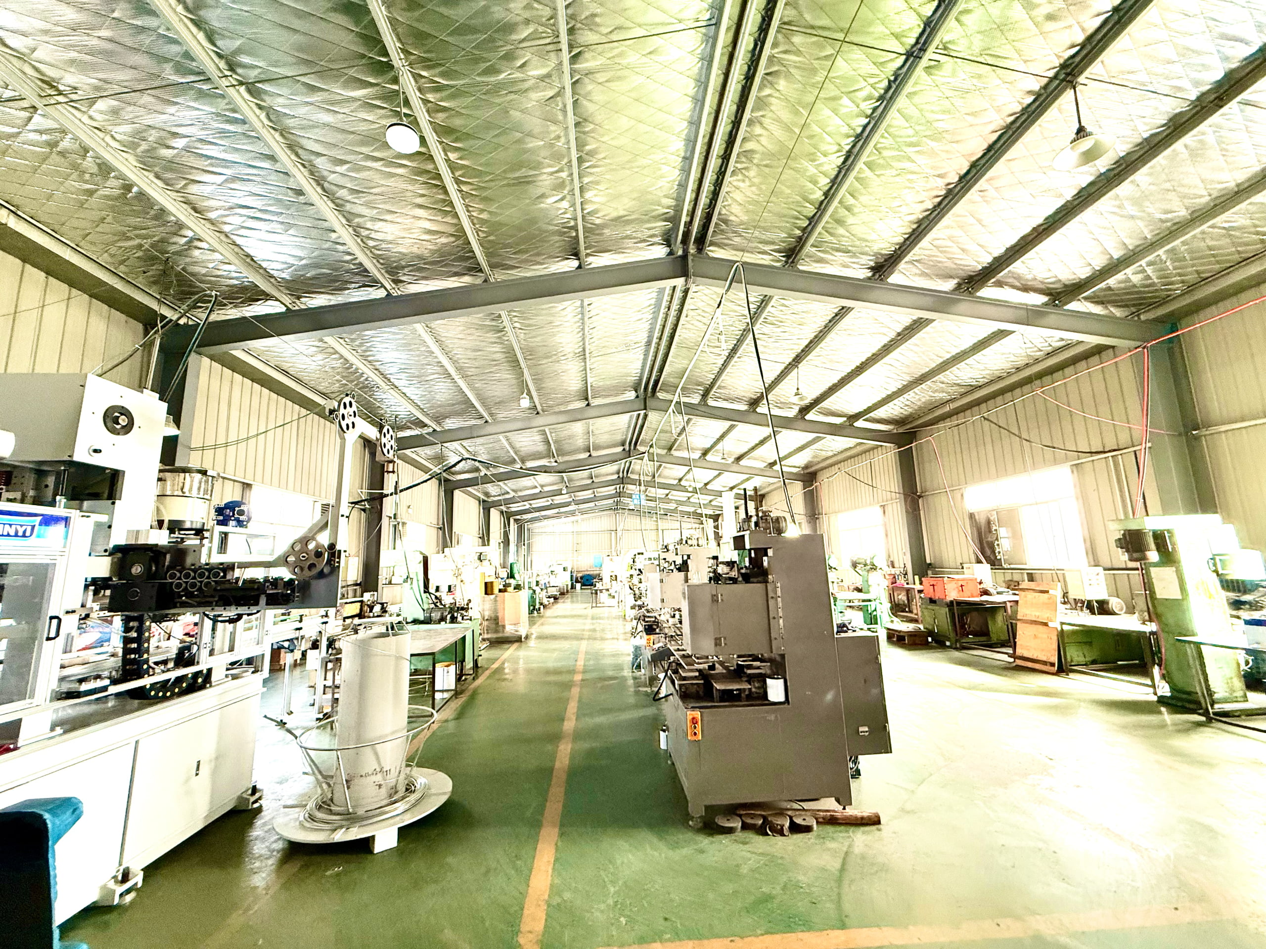 A production line showing tinplate cans being manufactured